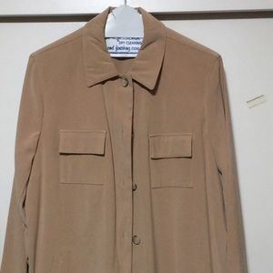 Beige jacket could be worn as a blouse